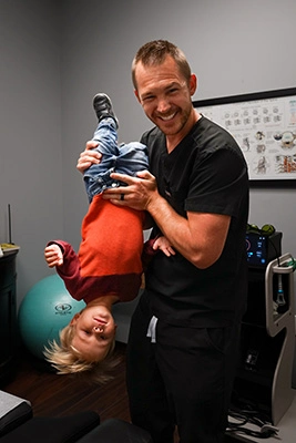 Chiropractor Parker CO Ben Lockie With Kid